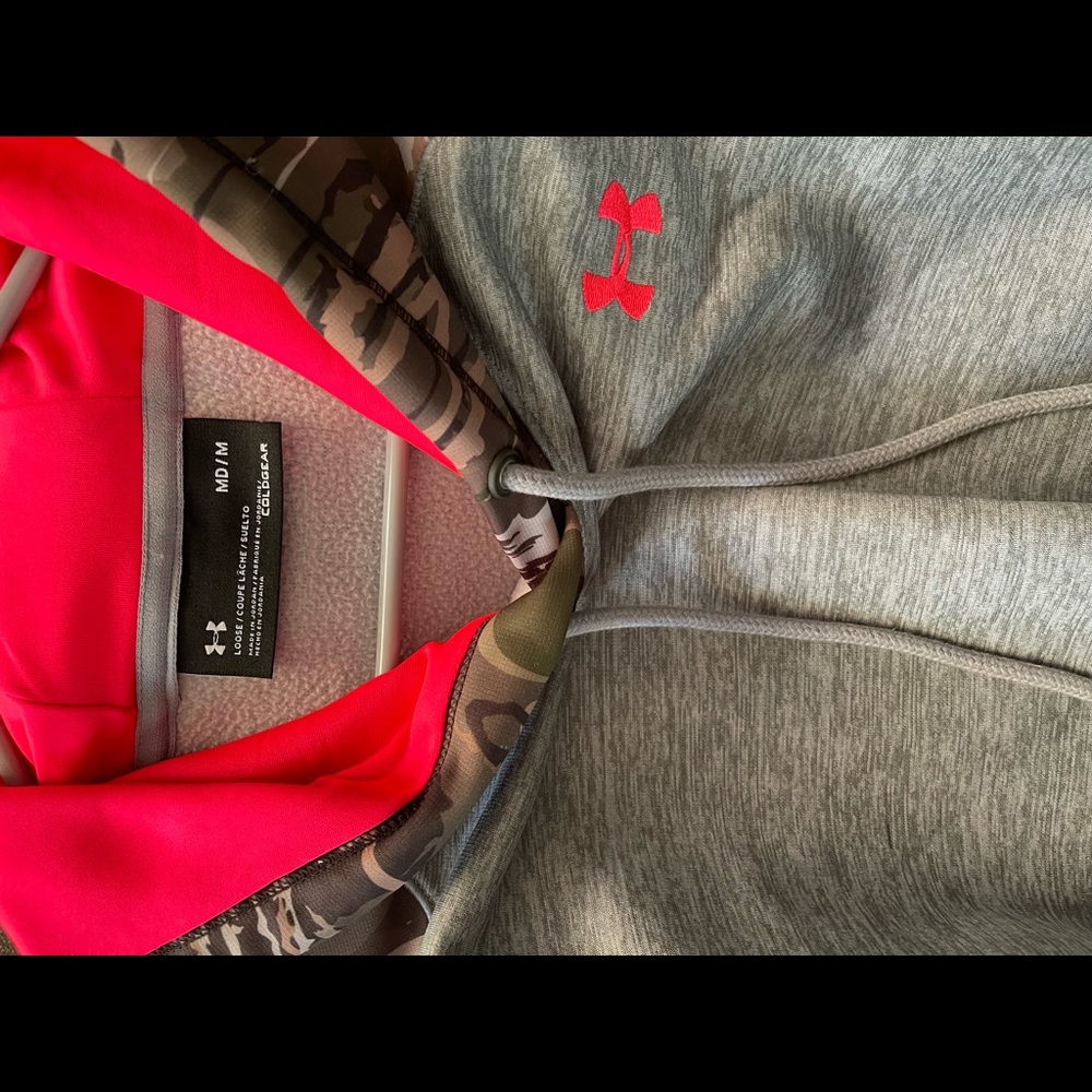 Under Armor Sweat shirt(hooded); gray with a pink emblem;camo arms and camo hood